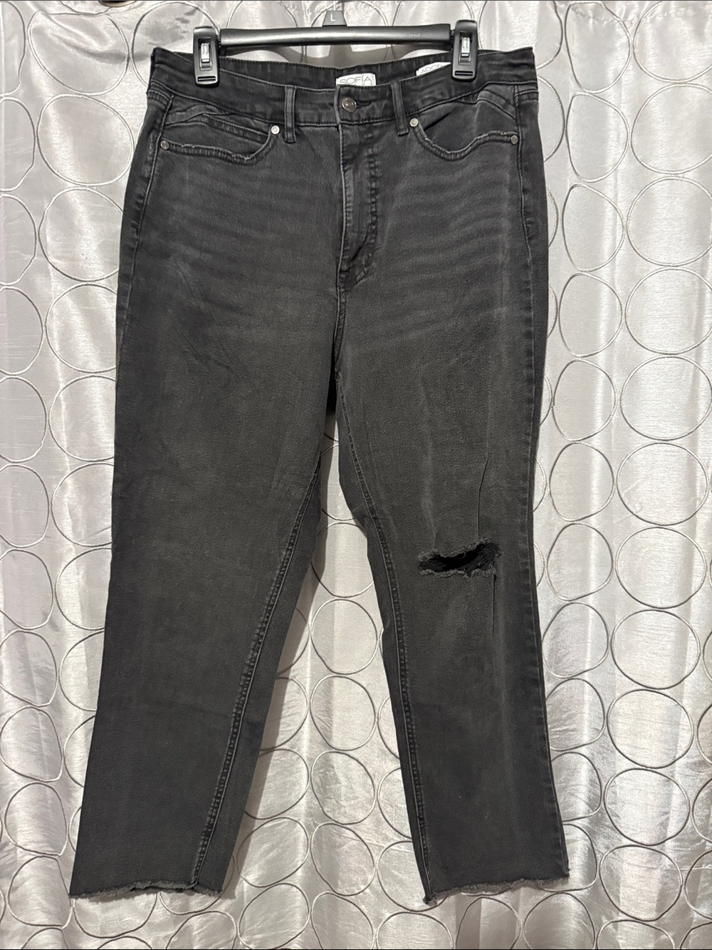 Women’s black ripped jeans